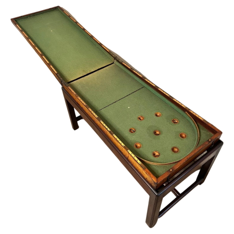 Image of a bagatelle game board