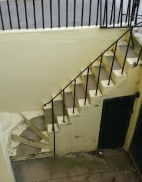 A contemorary photo of the steps leading to the basement of number 13
