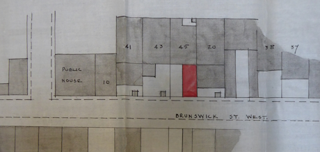 Photo of plans for the development of an adjacent property
