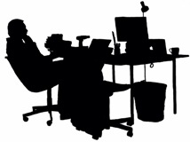 Silhouette of Nick Tyson, Curator of The RegencyTown House, at his desk