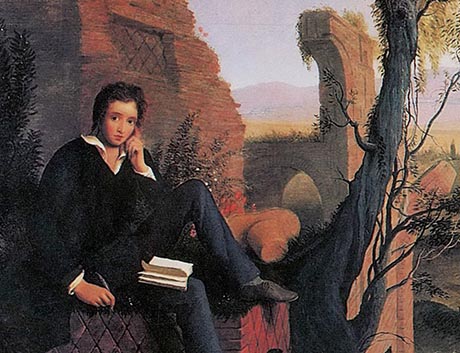 Painting showing Shelley sitting on a wall, with a quill in his hand and a notebook on his knee, in the background are building ruins and distant hills