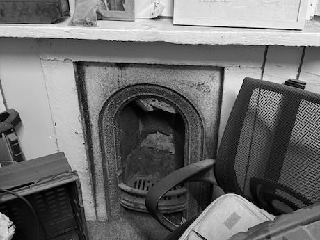 Limewashed hay loft above our stable