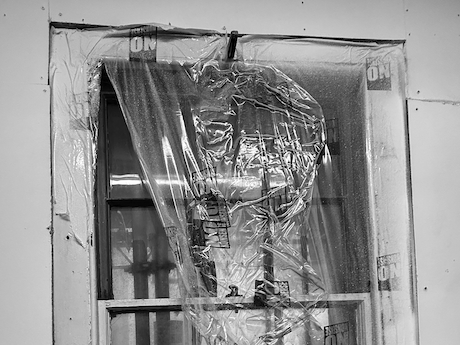 Limewashed hay loft above our stable