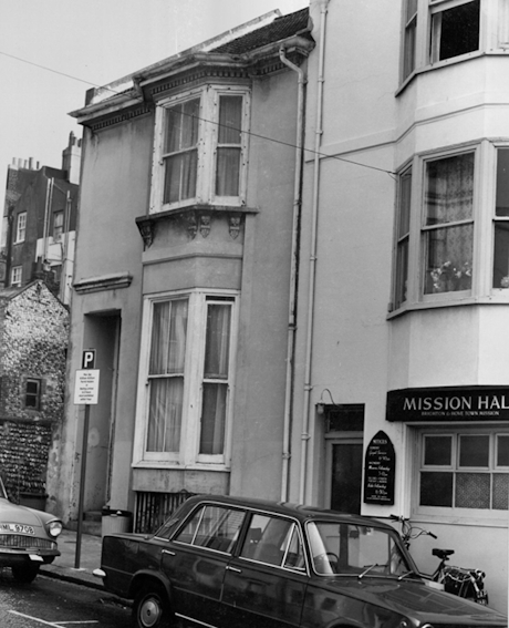 Monochrome image of a terraced house