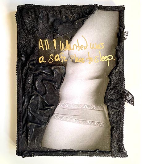 Photo of torso of a naked woman against a black textile, overlaid with gold handwriting: 'All I wanted was a Safe Place to Sleep'. 