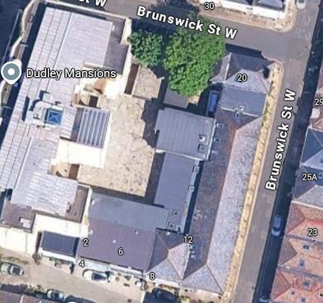 Colour image from above of a long building