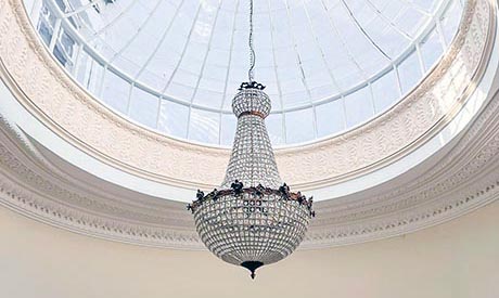 Photo of restored intricate plasterwork and roof-light