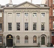 Photograph showing front elevation of Skinners' Hall, a Georgian style building of three storeys plus mansard, five bays wide and with a decorative pediment